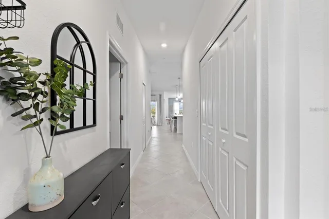 a kitchen with counter top space a sink and appliances