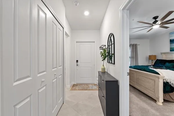 a kitchen with kitchen island a stove a table a sink and a refrigerator