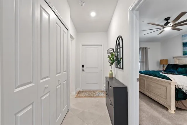 a kitchen with kitchen island a stove a table a sink and a refrigerator