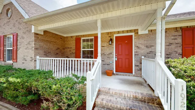 a porch with seating space