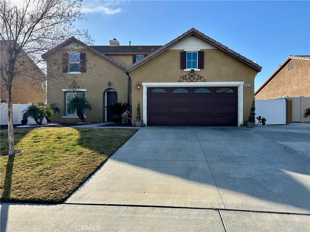 14675 Round Leaf Road Moreno Valley, CA 92555 - Photo 1 of 1 a front view of house with yard