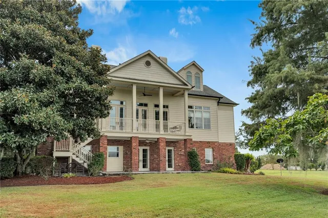 $965,000 | 7 Golf Villa Drive, New Orleans, LA 70131