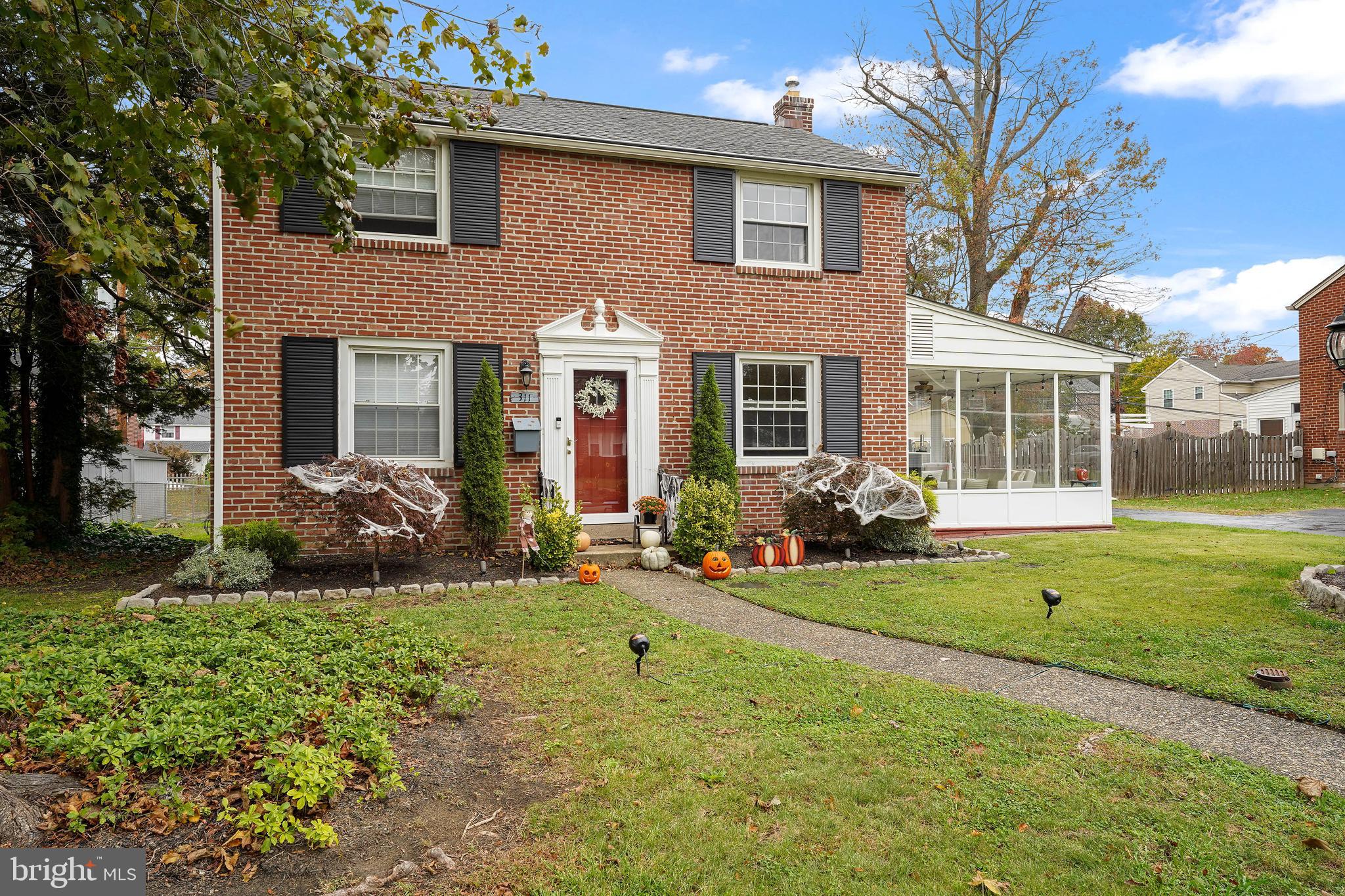 311 Avon Road Springfield, PA 19064 - Photo 1 of 38 a front view of a house with a yard
