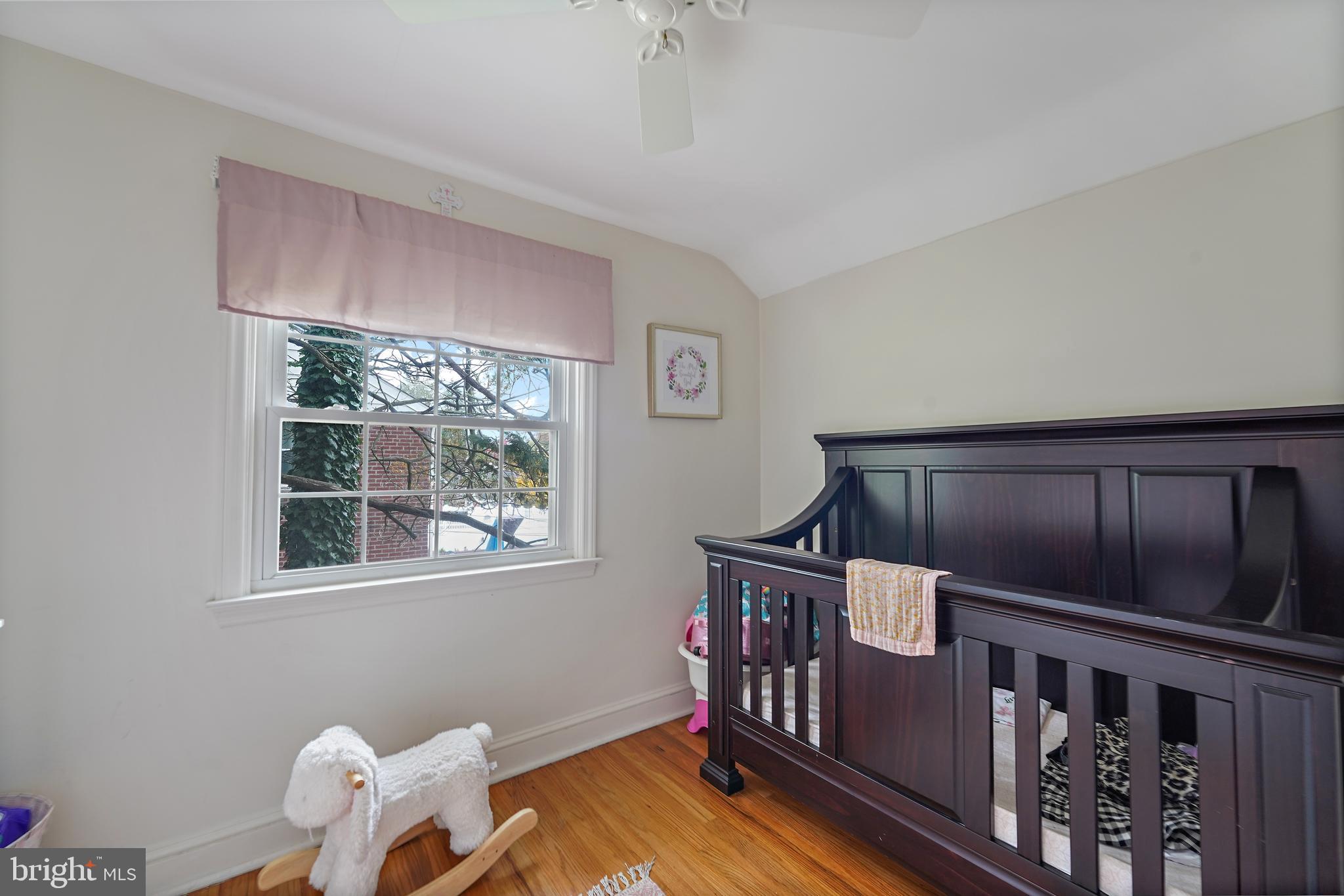 311 Avon Road Springfield, PA 19064 - Photo 24 of 38 a bedroom with furniture and a window