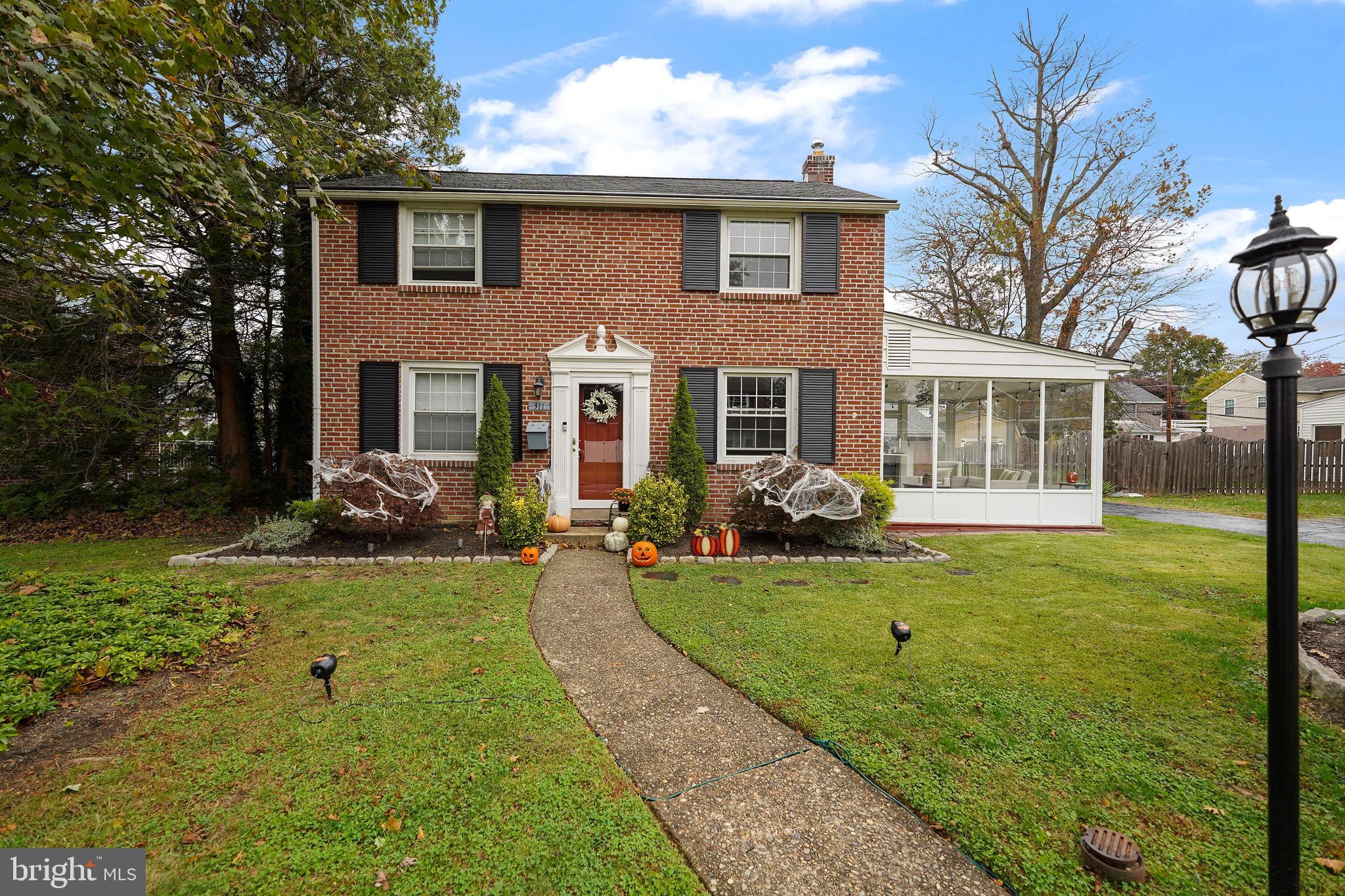 311 Avon Road Springfield, PA 19064 - Photo 32 of 38 a view of a house with a backyard