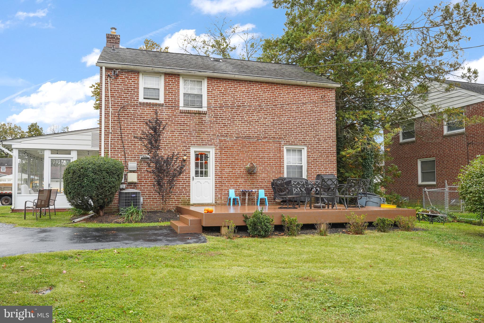 311 Avon Road Springfield, PA 19064 - Photo 35 of 38 a front view of house with a garden and patio