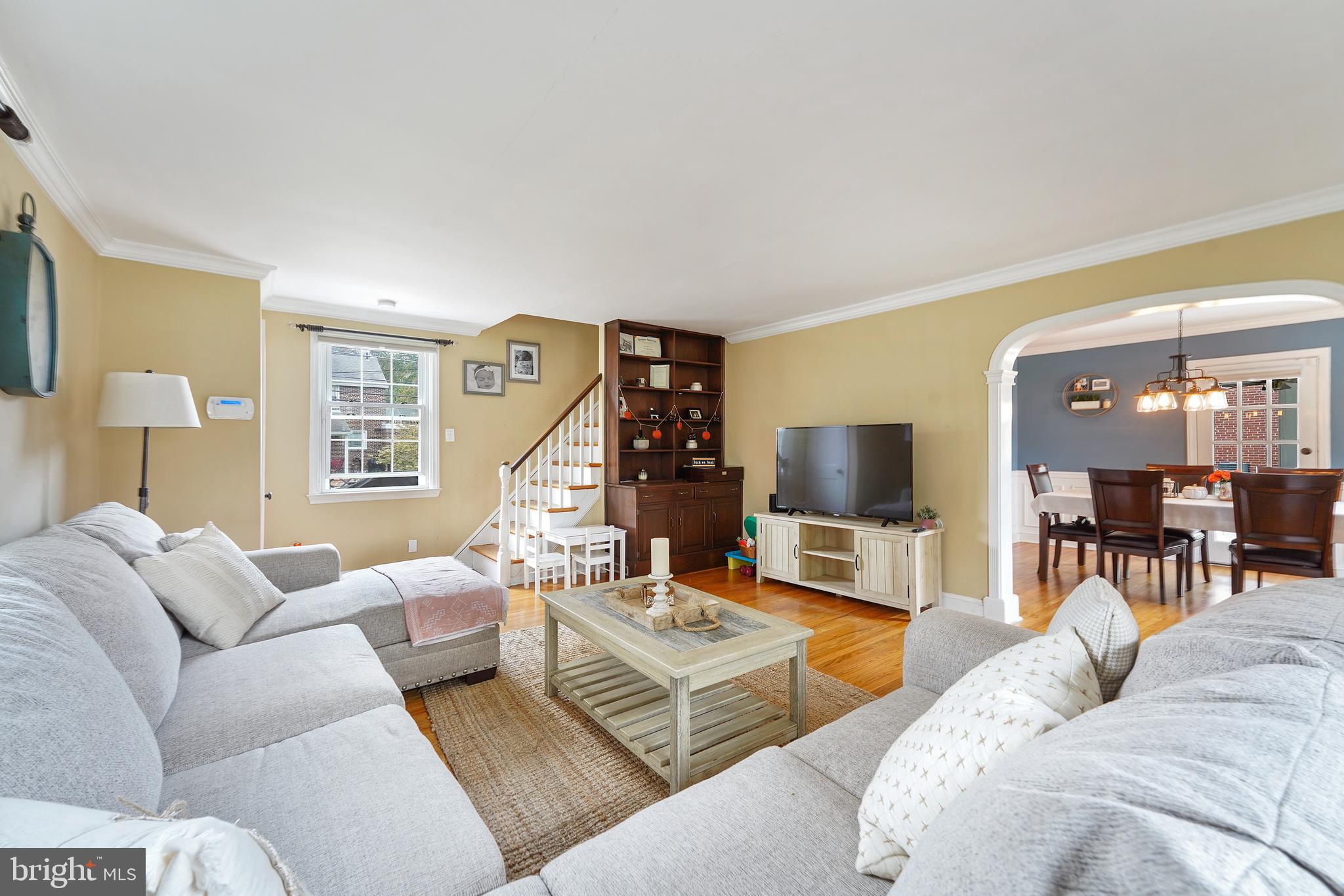 311 Avon Road Springfield, PA 19064 - Photo 6 of 38 a living room with furniture and a flat screen tv