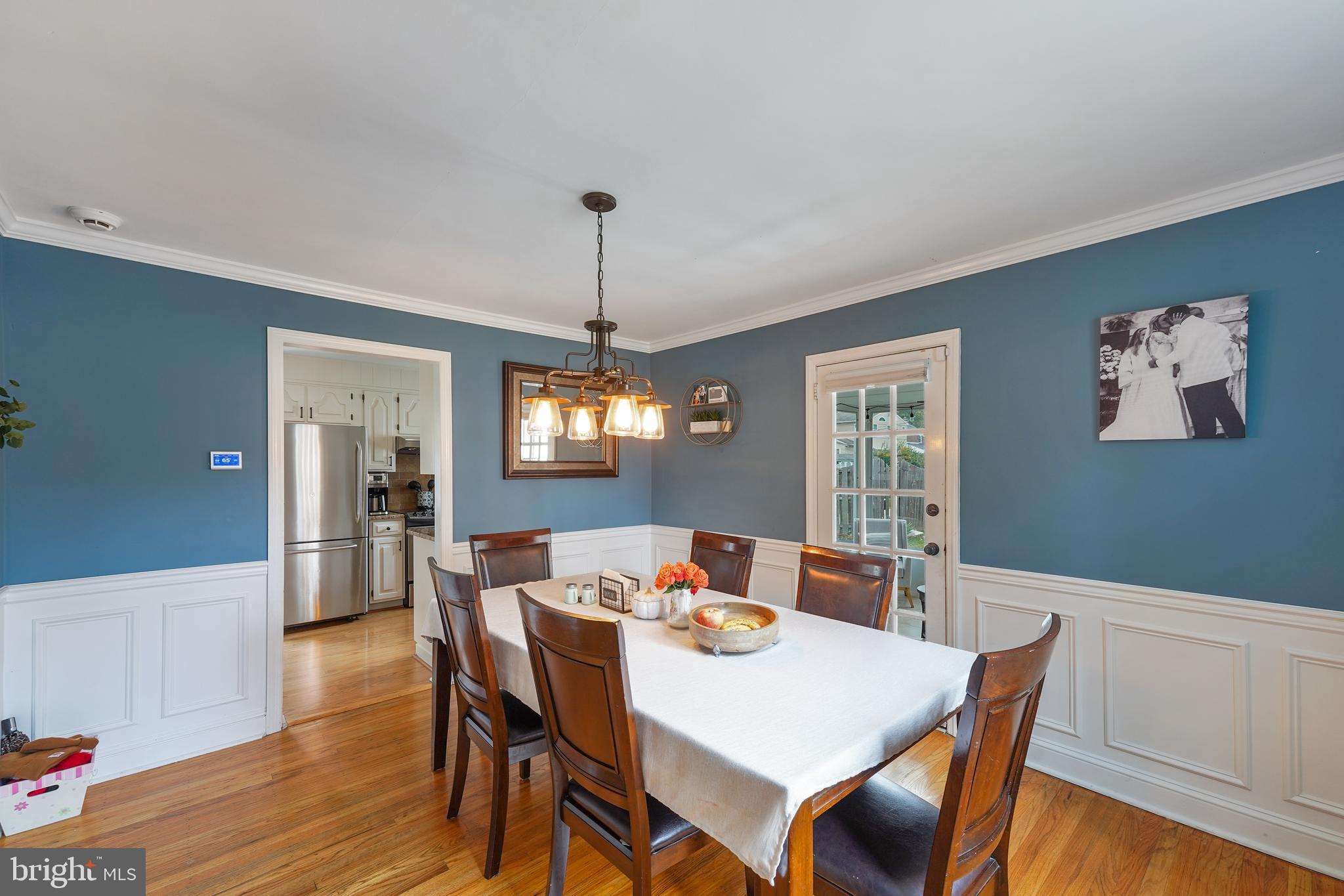 311 Avon Road Springfield, PA 19064 - Photo 7 of 38 a view of a dining room with furniture window and wooden floor