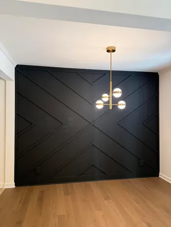 a living room with a fireplace and a wooden floor