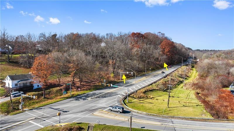 0 Smith Township State Road Burgettstown, PA 15021 - Photo 12 of 24 a view of a swimming pool with a yard and seating area