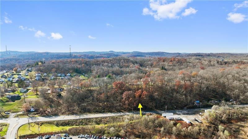 0 Smith Township State Road Burgettstown, PA 15021 - Photo 5 of 24 a view of a lake with a mountain