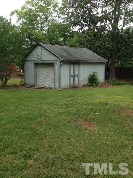 306 Wilmot Drive Raleigh, NC 27606 - Photo 3 of 10 a front view of a house with a yard