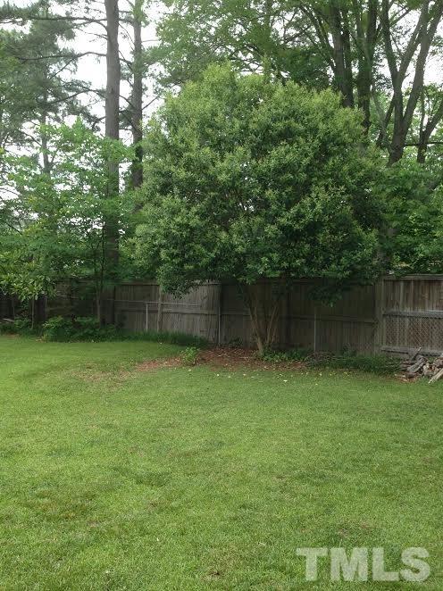 306 Wilmot Drive Raleigh, NC 27606 - Photo 4 of 10 a backyard of a house