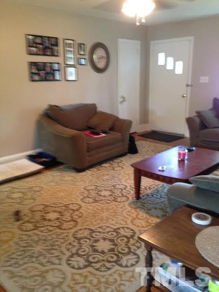 306 Wilmot Drive Raleigh, NC 27606 - Photo 6 of 10 a living room with furniture