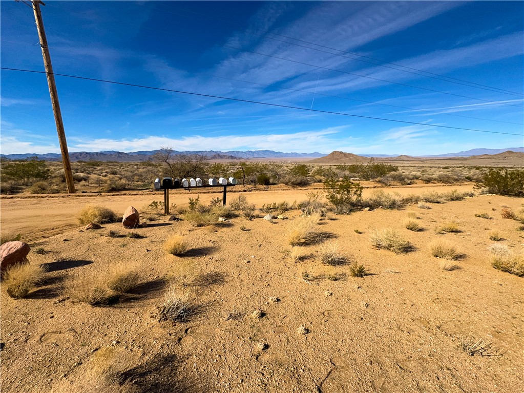 10210 Boulder Road Kingman, AZ 86401 - Photo 13 of 30 View of mountain background with a desert landscape and rural landscape