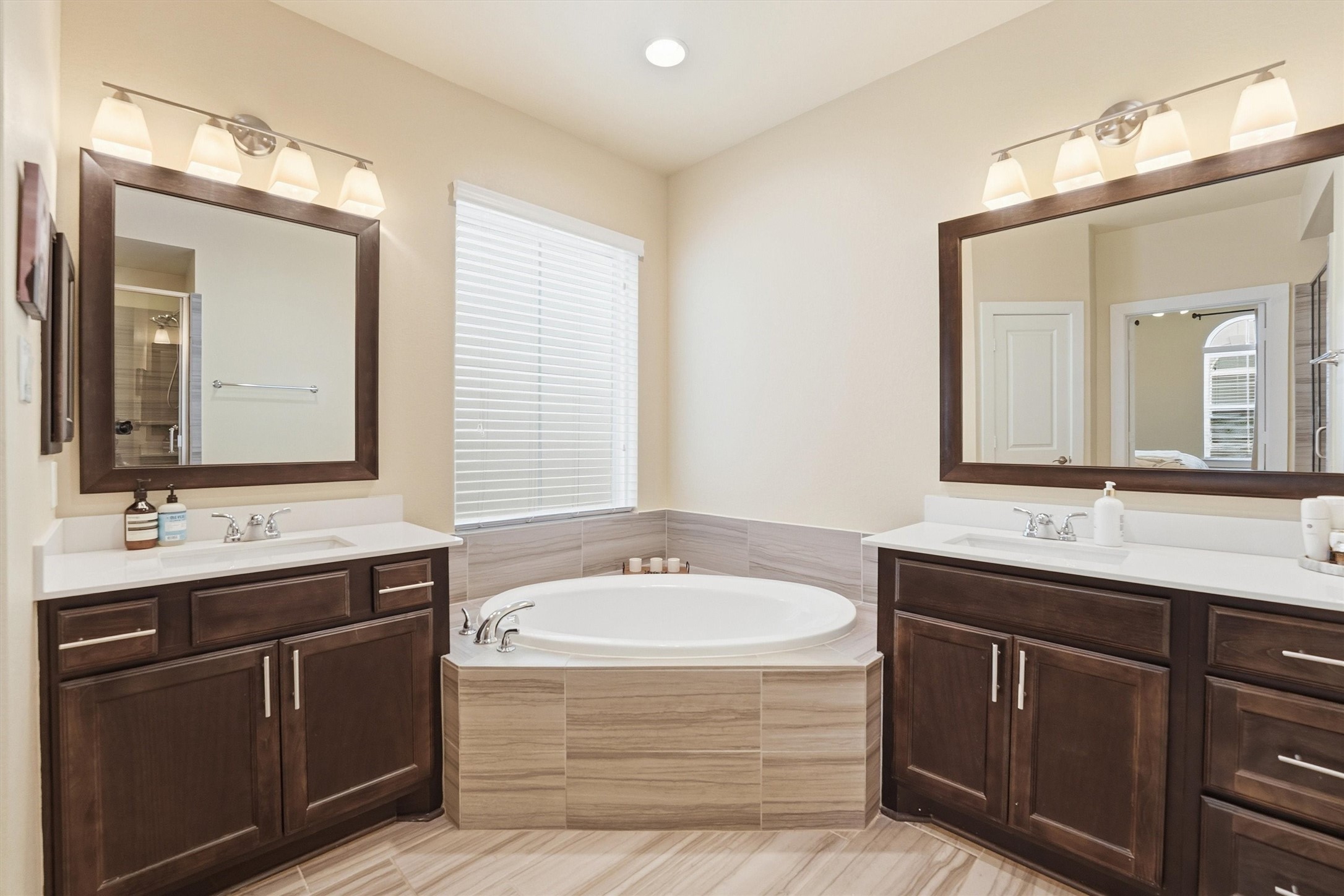 2714 Freund Street Houston, TX 77003 - Photo 19 of 29 a bathroom with a bathtub double sink and mirror