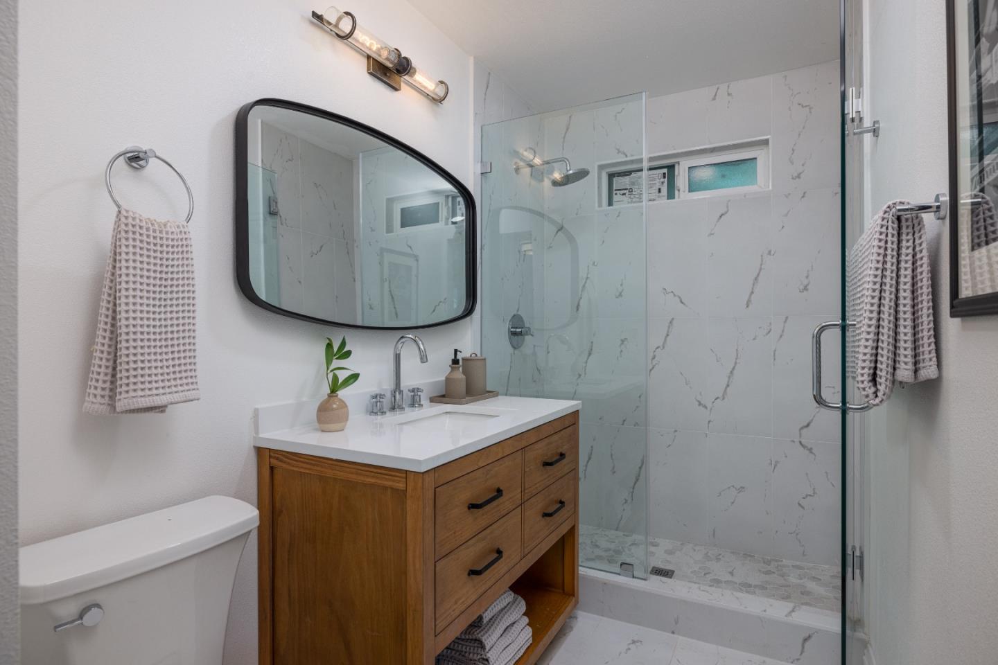 2005 Mento Drive Fremont, CA 94539 - Photo 14 of 22 a bathroom with a sink toilet and shower