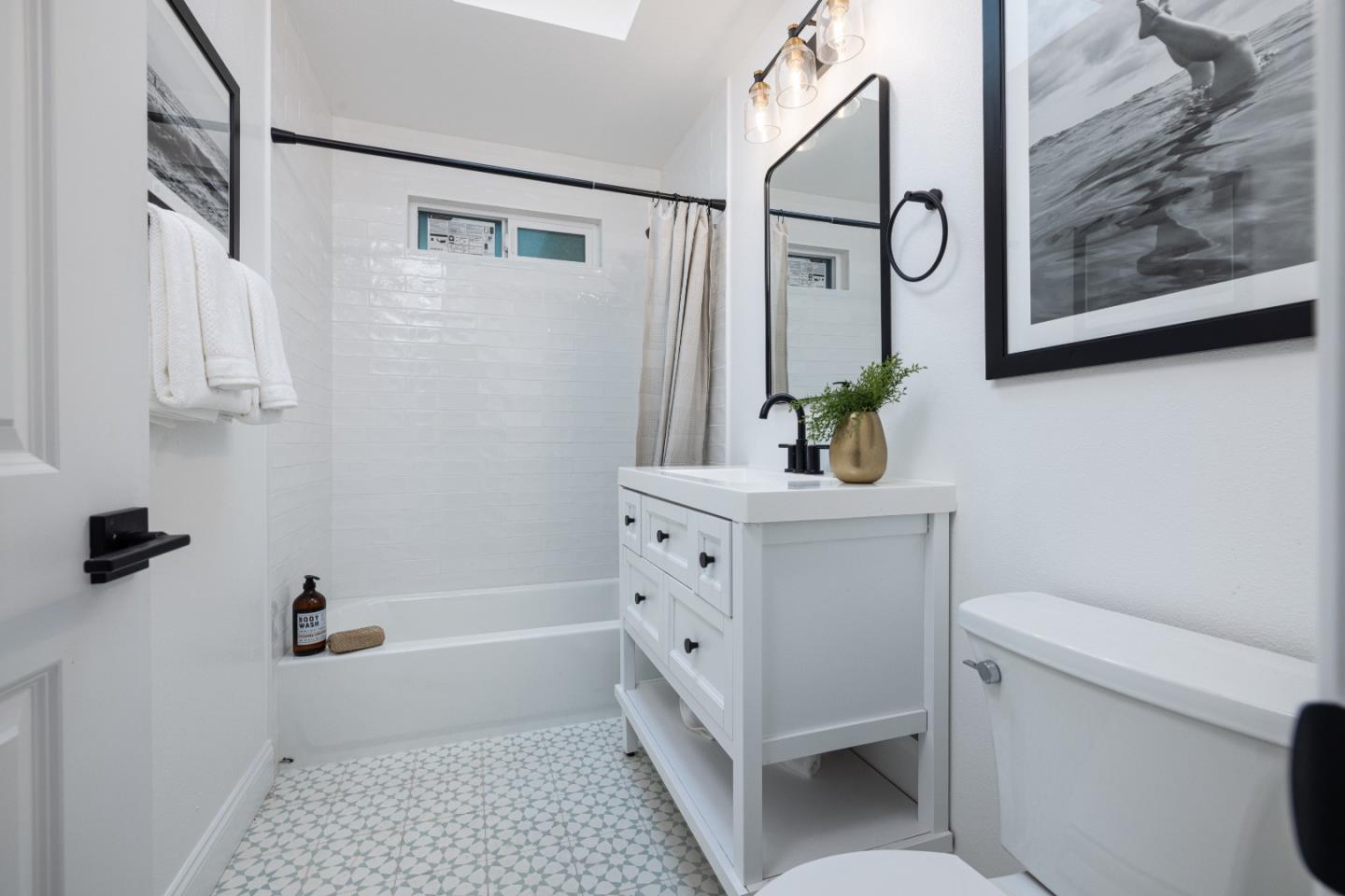 2005 Mento Drive Fremont, CA 94539 - Photo 17 of 22 a bathroom with a bathtub sink and toilet