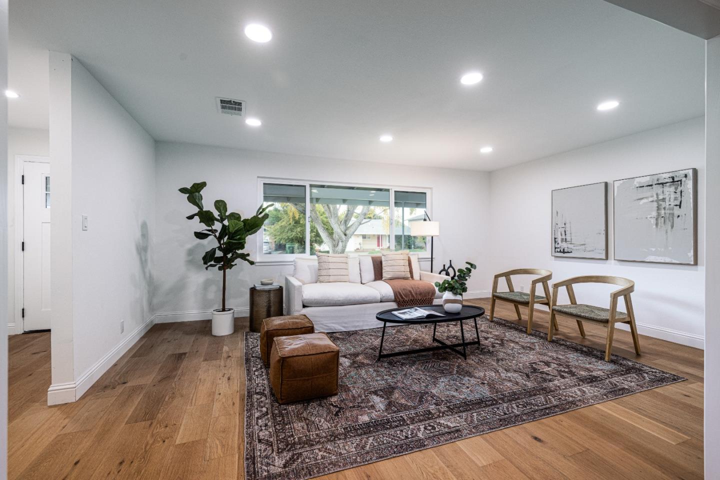 2005 Mento Drive Fremont, CA 94539 - Photo 2 of 22 a living room with furniture and a wooden floor