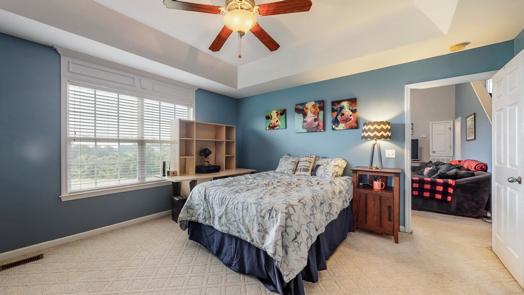 2981 Lewis Road Santa Fe, TN 38482 - Photo 13 of 32 a bedroom with a bed and a chandelier