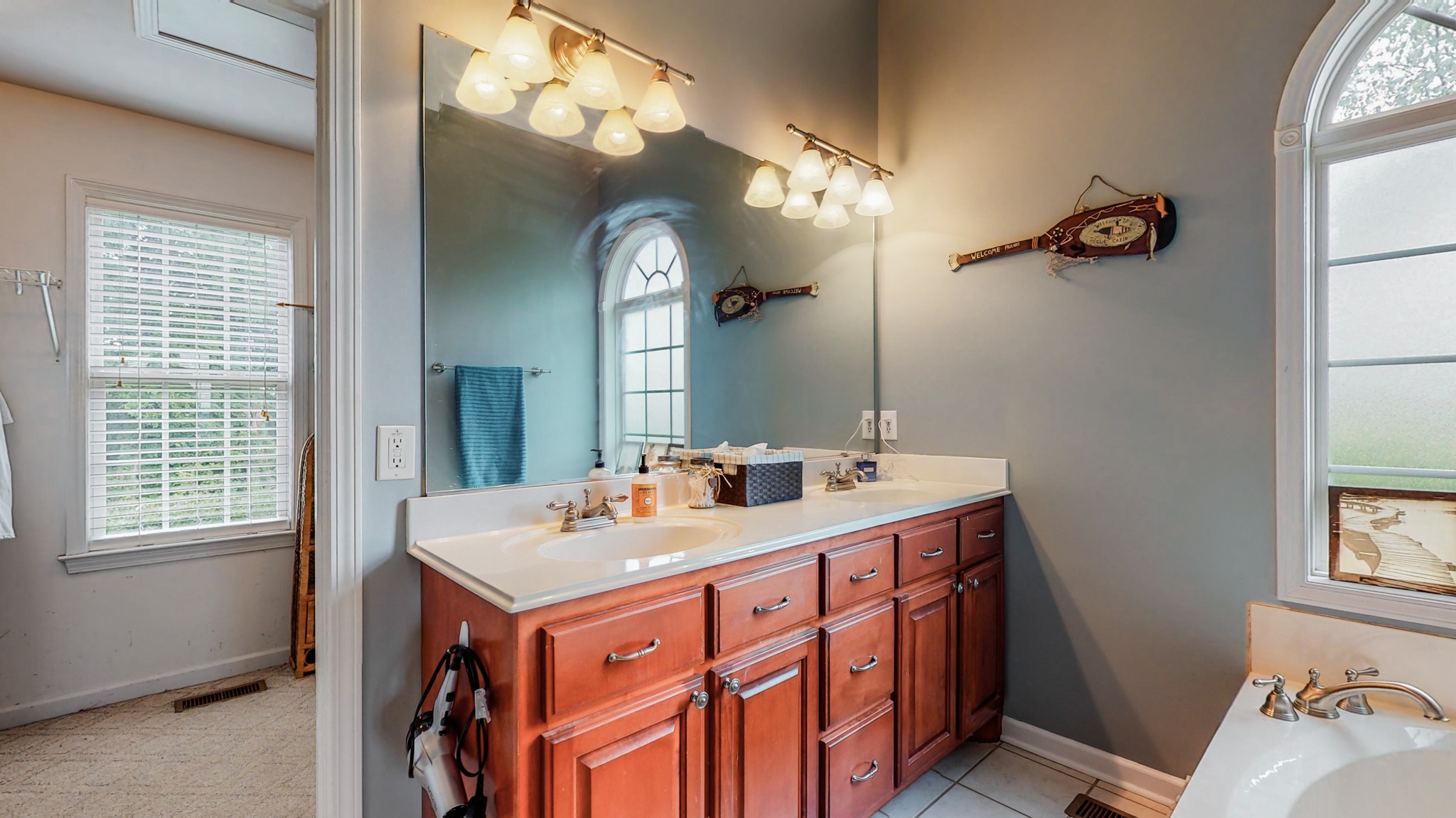 2981 Lewis Road Santa Fe, TN 38482 - Photo 15 of 32 a bathroom with a sink double vanity and a mirror