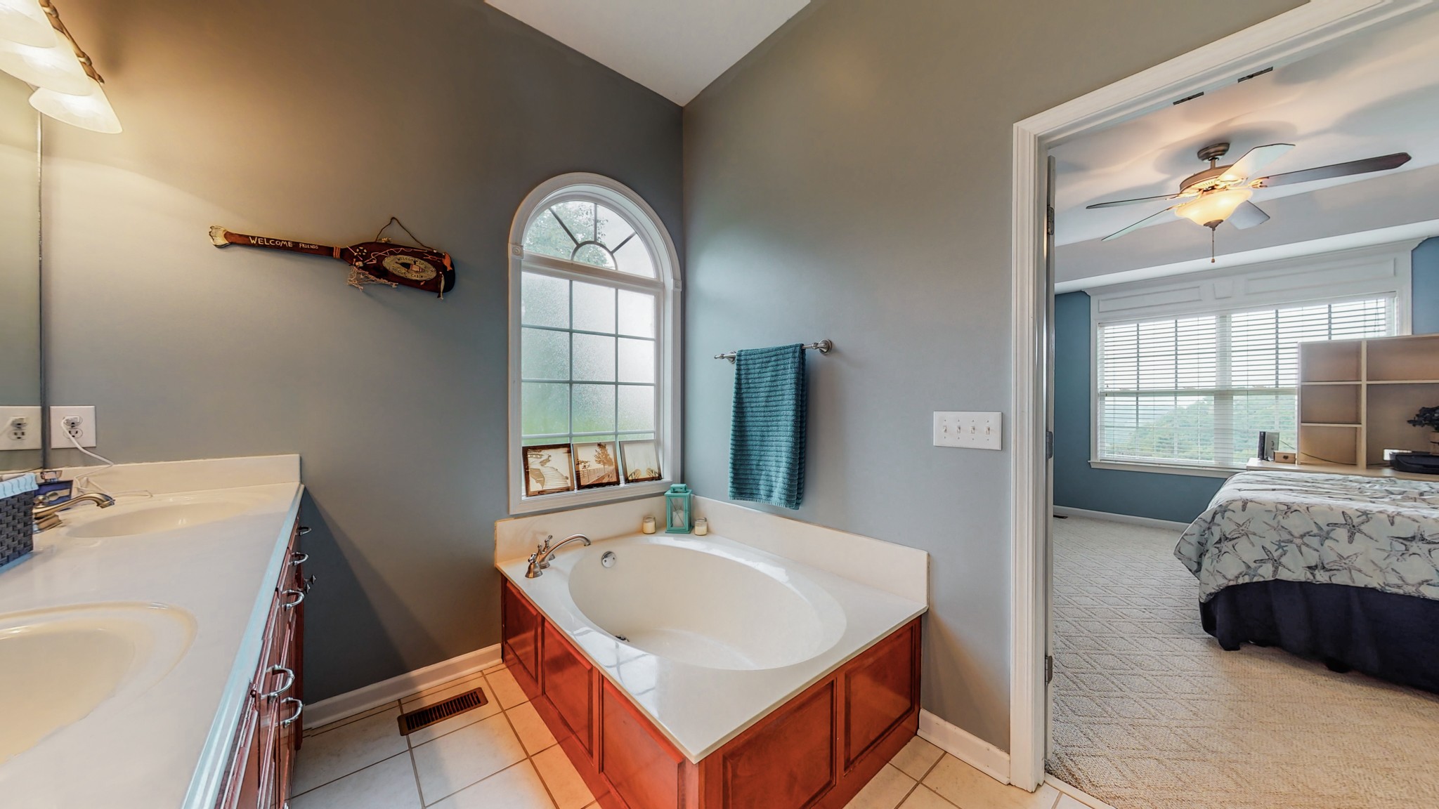 2981 Lewis Road Santa Fe, TN 38482 - Photo 17 of 32 a en suite bathroom with a sink and a mirror