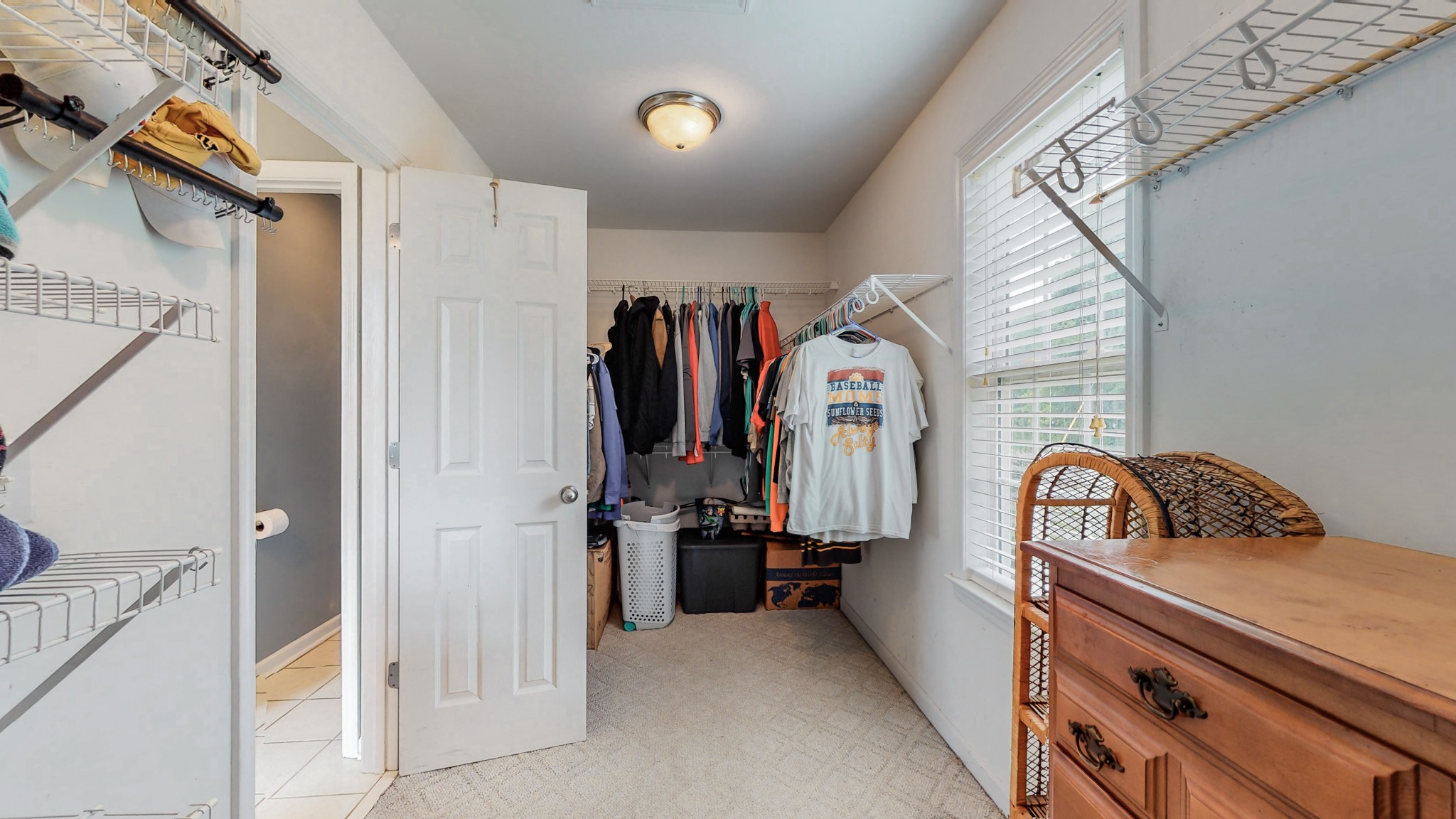 2981 Lewis Road Santa Fe, TN 38482 - Photo 18 of 32 a view of walk in closet with clothes and shoes