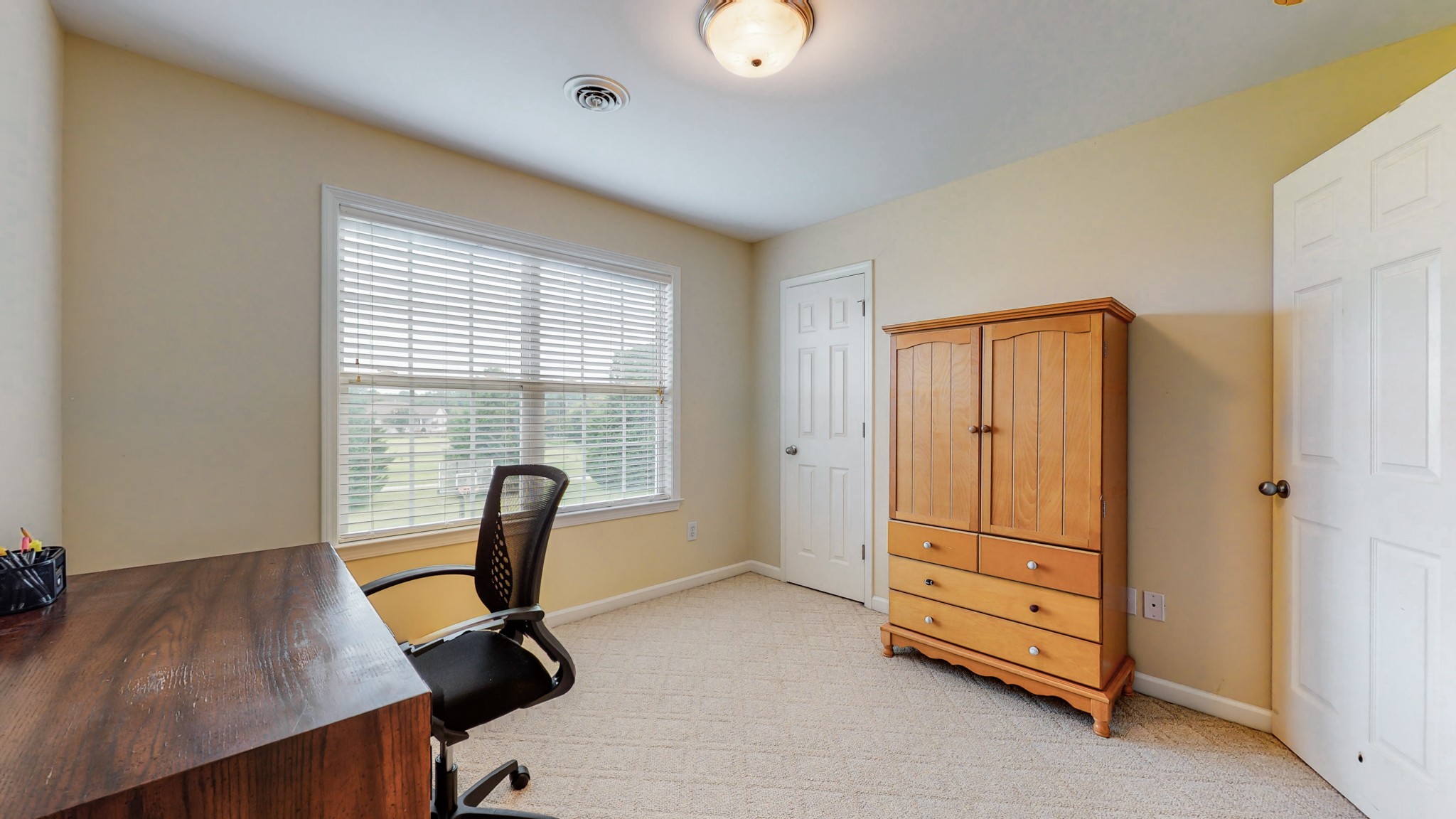 2981 Lewis Road Santa Fe, TN 38482 - Photo 26 of 32 a view of a workspace with furniture and a window