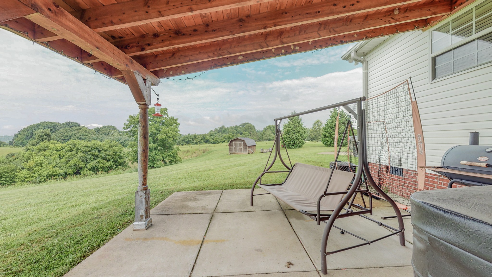 2981 Lewis Road Santa Fe, TN 38482 - Photo 30 of 32 a view of a backyard with sitting area