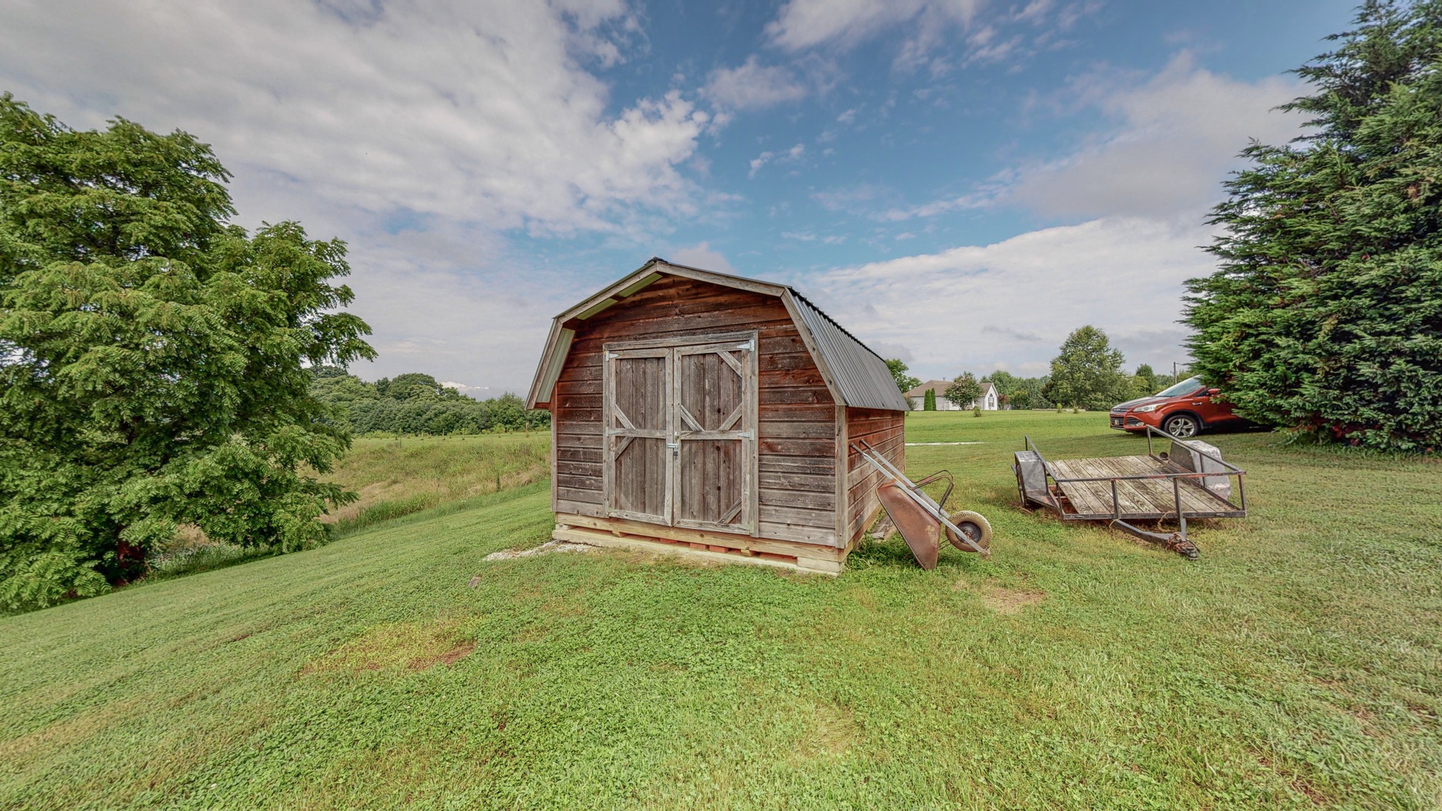 2981 Lewis Road Santa Fe, TN 38482 - Photo 31 of 32 a view of a tiny house with garden