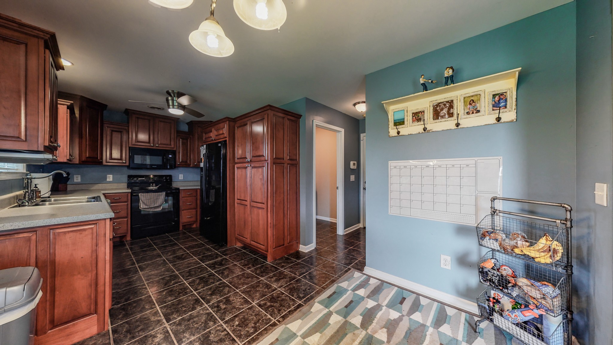 2981 Lewis Road Santa Fe, TN 38482 - Photo 10 of 32 a kitchen with stainless steel appliances granite countertop a refrigerator and a stove top oven