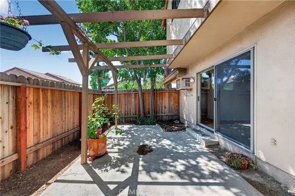 a backyard with table and chairs