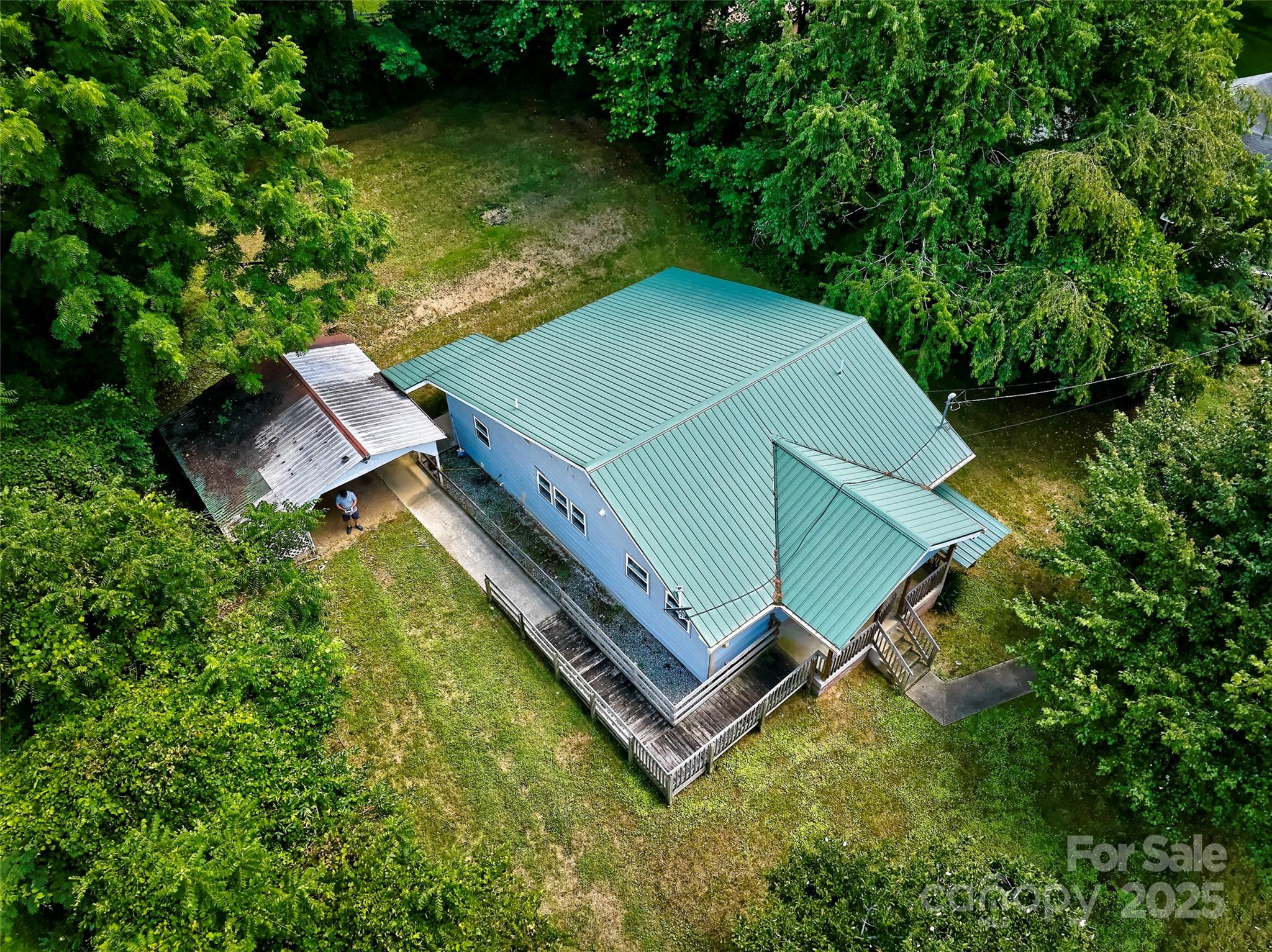 111 Kenneth Cooper Road Whittier, NC 28789 - Photo 23 of 30 an aerial view of a backyard