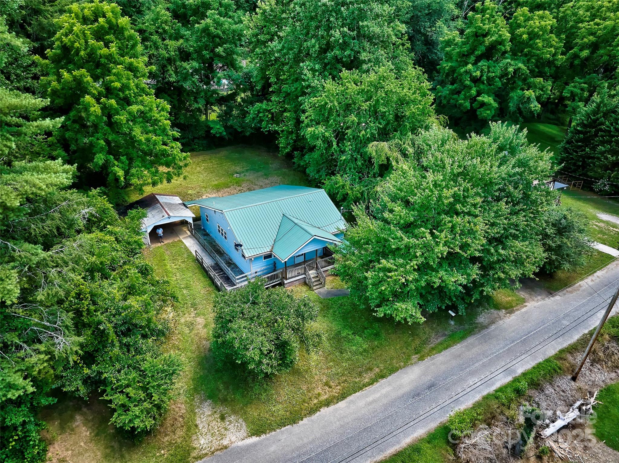 111 Kenneth Cooper Road Whittier, NC 28789 - Photo 24 of 30 an aerial view of a house with a yard