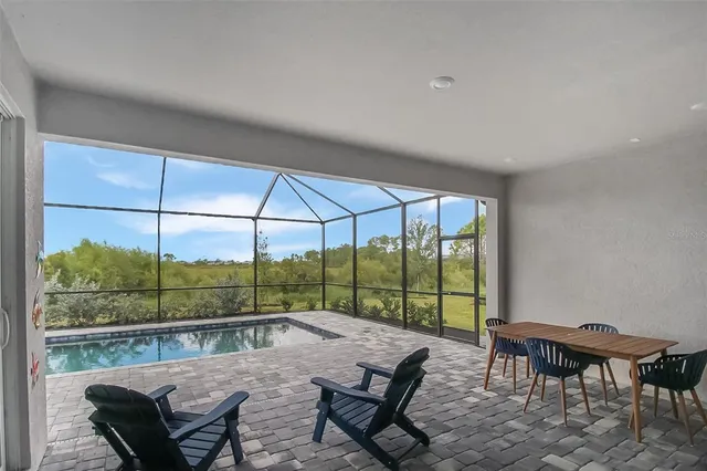 a view of yard with sitting area