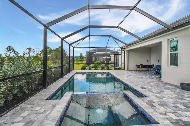 a view of a balcony with sitting area
