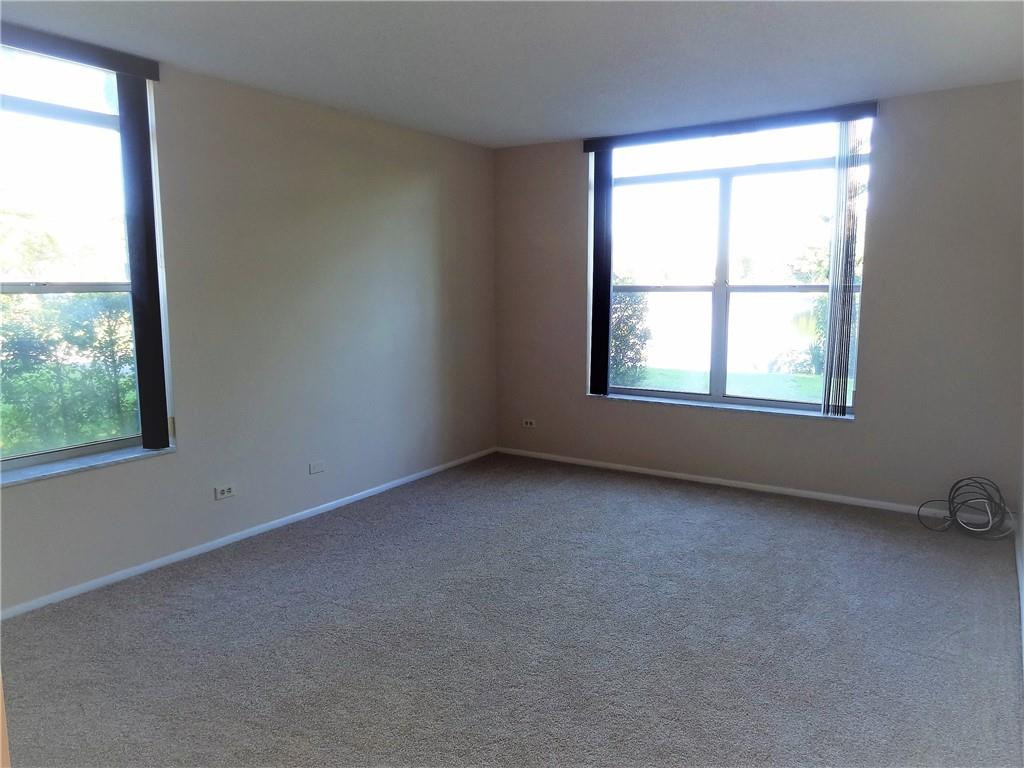 3670 Inverrary Drive, Unit 1L Lauderhill, FL 33319 - Photo 16 of 26 an empty room with a window