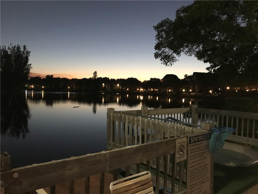 3670 Inverrary Drive, Unit 1L Lauderhill, FL 33319 - Photo 18 of 26 a view of city from deck with lake view