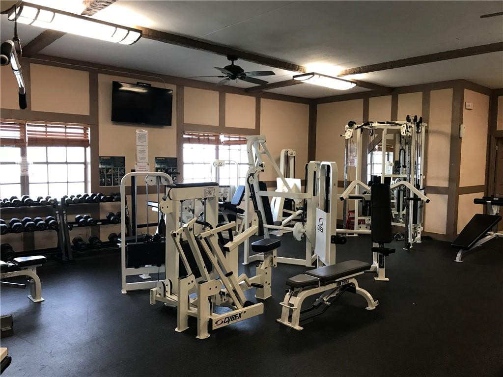 3670 Inverrary Drive, Unit 1L Lauderhill, FL 33319 - Photo 25 of 26 a view of a room with gym equipment