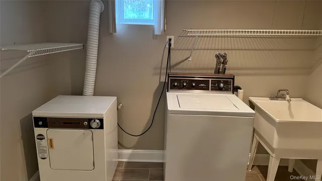 a utility room with dryer and washer