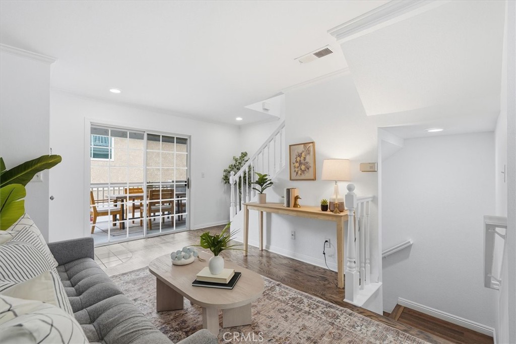 1534 Marcelina Avenue, Unit D Torrance, CA 90501 - Photo 12 of 29 a living room with furniture and wooden floor