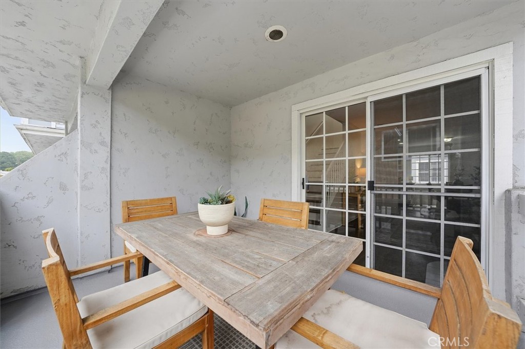 1534 Marcelina Avenue, Unit D Torrance, CA 90501 - Photo 20 of 29 a view of a dining room with furniture and wooden floor