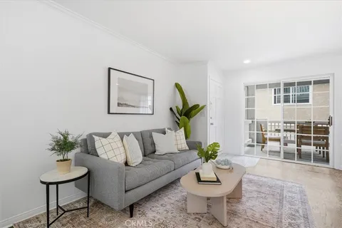 a living room with furniture and window