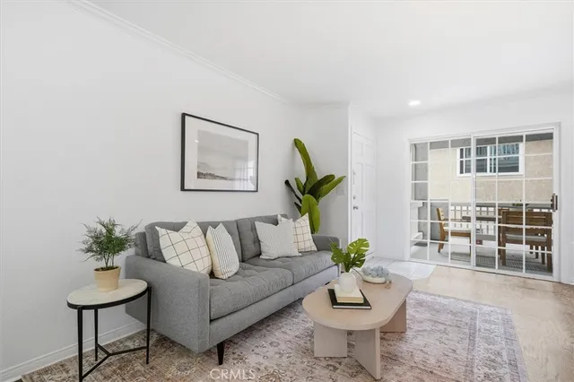 a living room with furniture and window