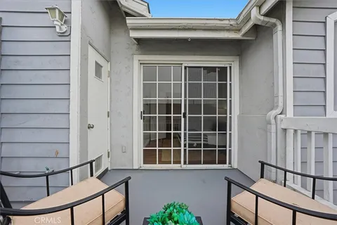 a view of front door with stairs
