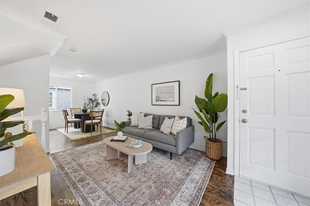 1534 Marcelina Avenue, Unit D Torrance, CA 90501 - Photo 4 of 29 a living room with furniture and wooden floor