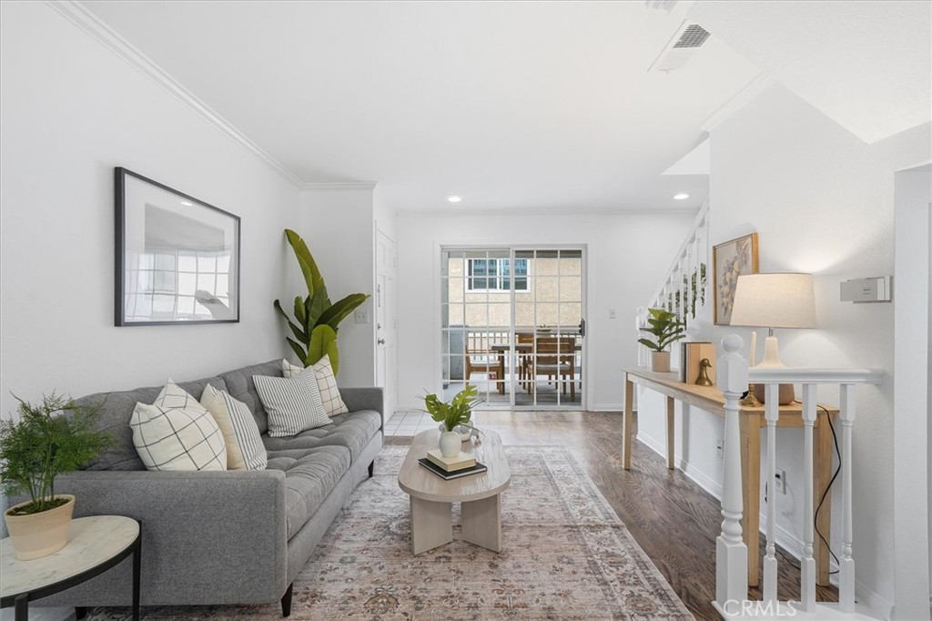 1534 Marcelina Avenue, Unit D Torrance, CA 90501 - Photo 5 of 29 a living room with furniture and a wooden floor