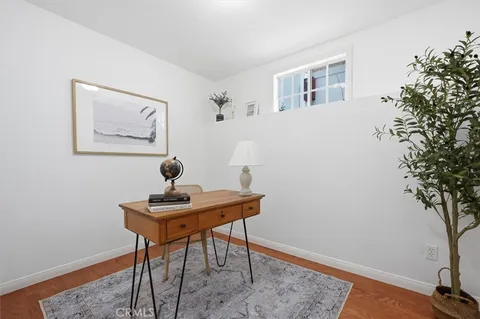 a view of a workspace with furniture