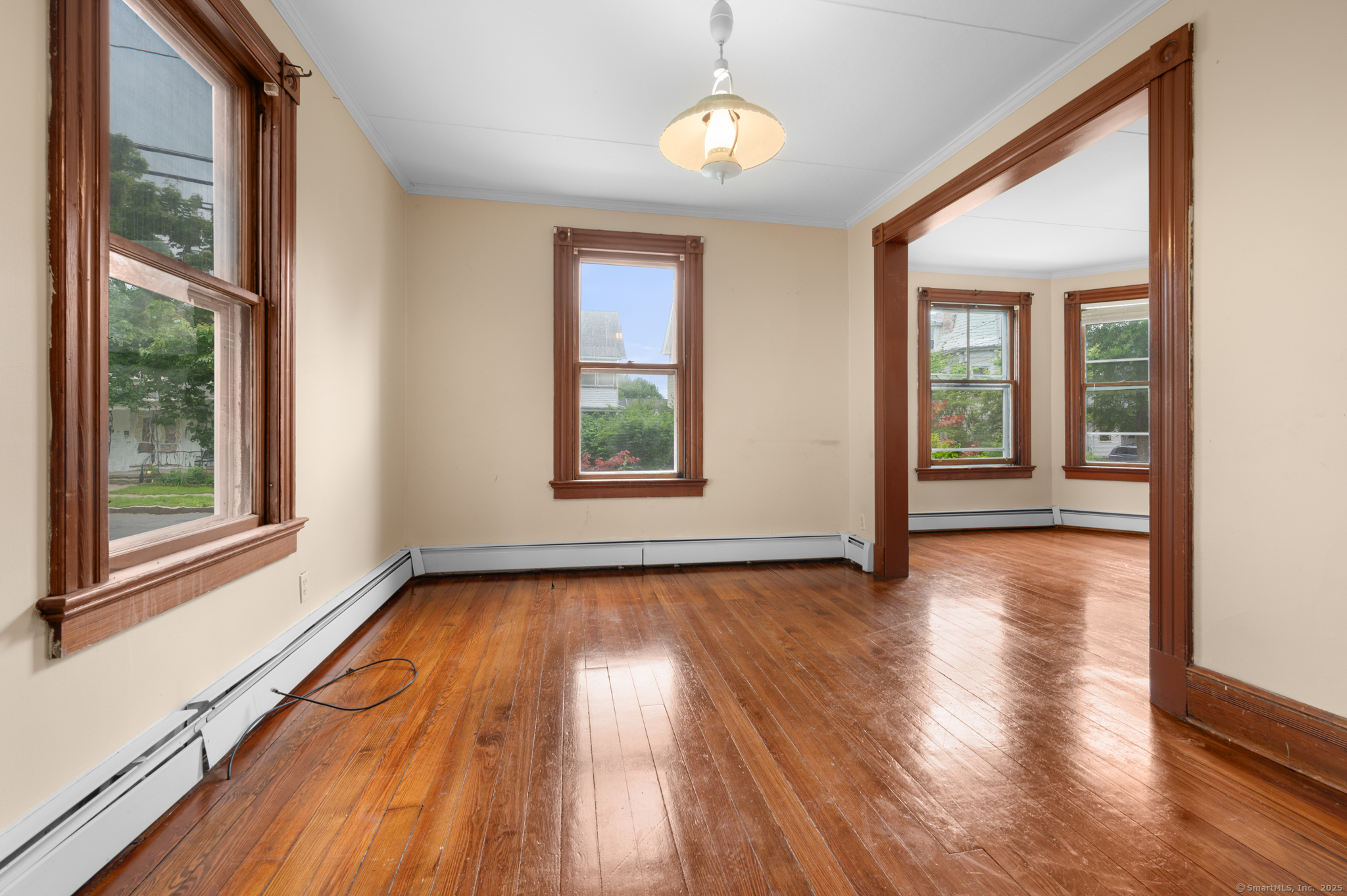 175 Lincoln Street Middletown, CT 06457 - Photo 15 of 33 a view of an empty room with wooden floor and a window