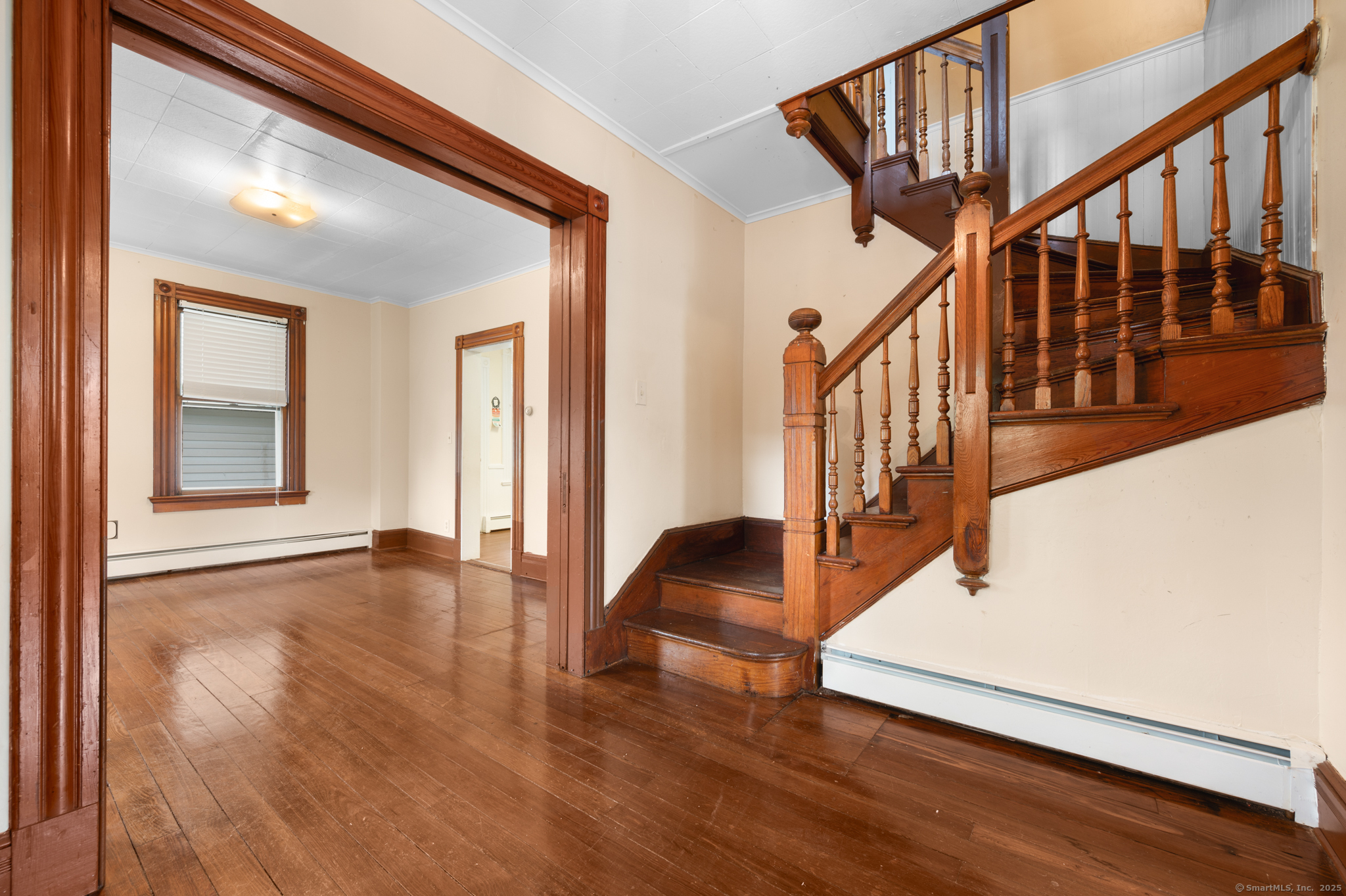 175 Lincoln Street Middletown, CT 06457 - Photo 19 of 33 a view of an entryway with wooden floor and stairs